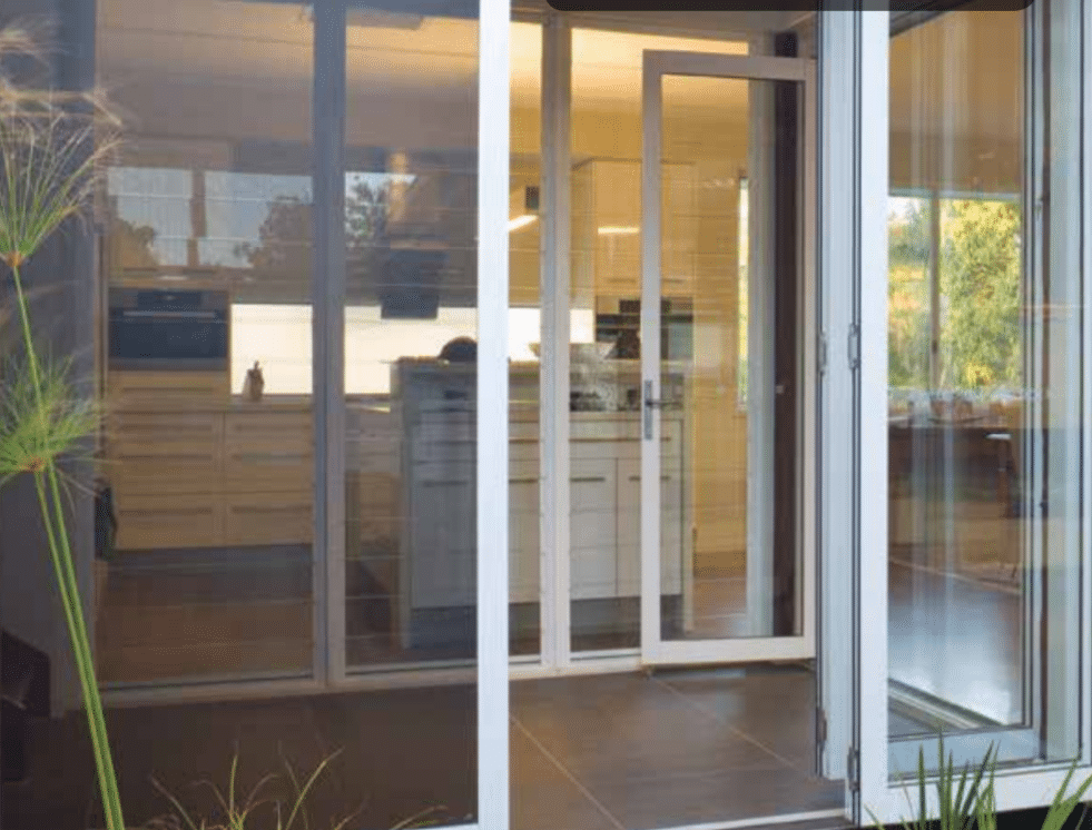 White bifold doors - security door installation sunshine coast - Alpha Screens