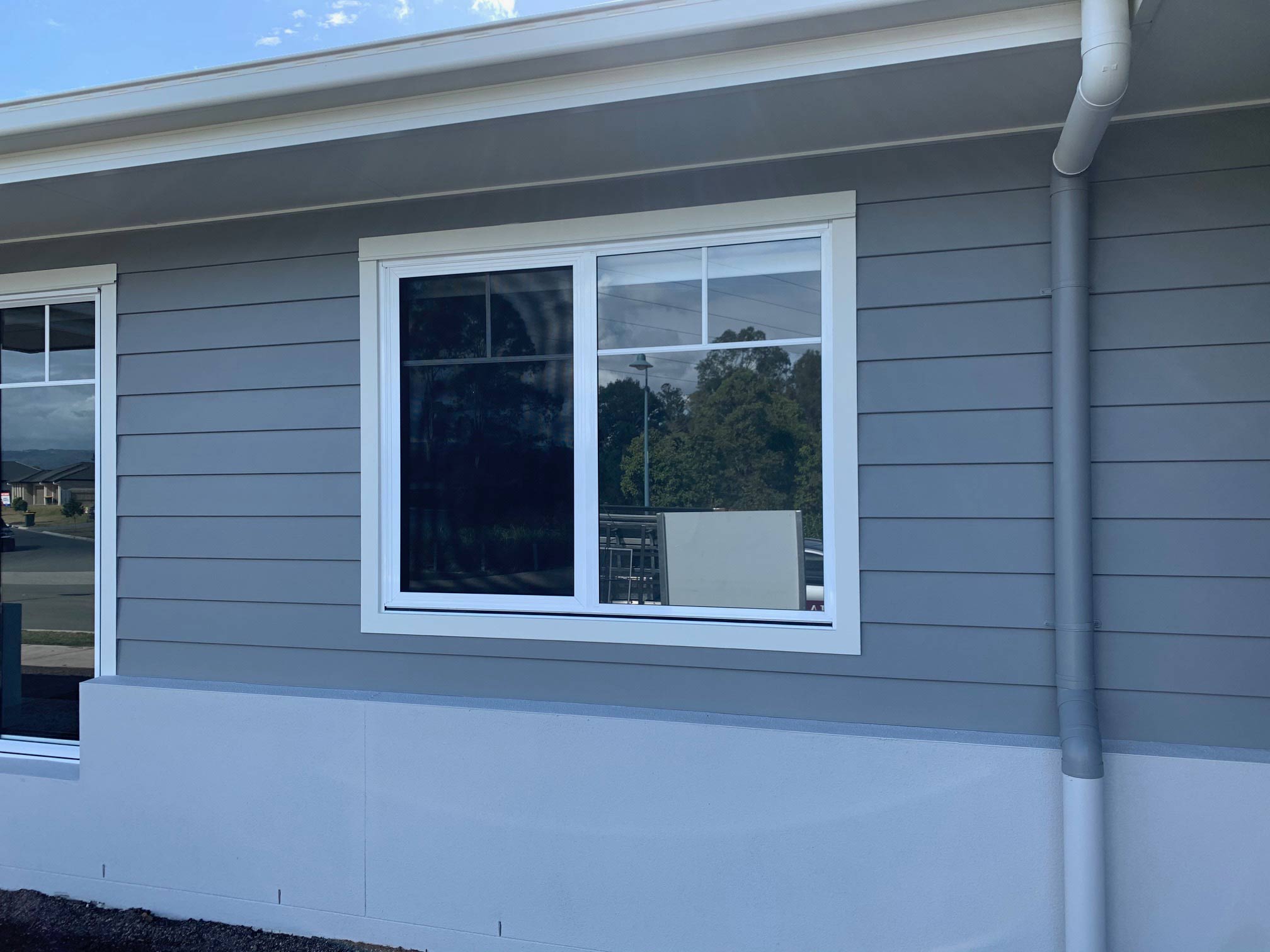 White Stainless Sliding Window — Security Screen Doors in Sunshine Coast, QLD