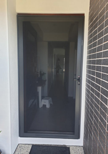 Open Black Stainless Hinged Door — Security Screen Doors in Sunshine Coast, QLD