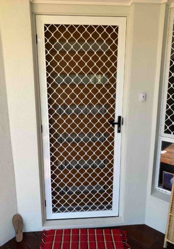 White 7mm Diamond Grille Security Screen installed on the front door in a Sunshine Coast home