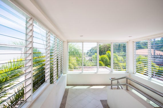 glass louvre window in a lounge room of a sunshine coast home