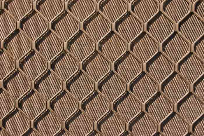Close Up Image Of Diamond Grille Of A Security Door