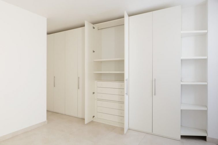 Interior Of Modern Empty Apartment, Wardrobe — Alpha Screens & Glass In Maroochydore, QLD Interior Of Modern Empty Apartment, Wardrobe — Alpha Screens & Glass In Maroochydore, QLD