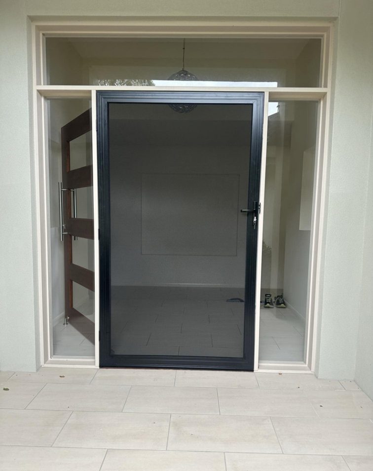 Fly Screen Installed in The Main Door Fly Screen Installed in The Main Door