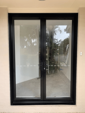 glass french door with black aluminium frame installation sunshine coast