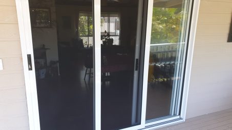 Three Panel Stacking Door with Security Screens